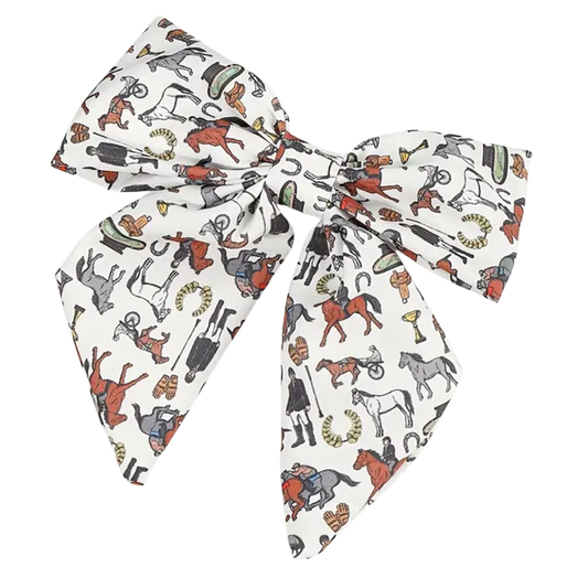 Bow-shaped fabric with horse and rider pattern on a white background